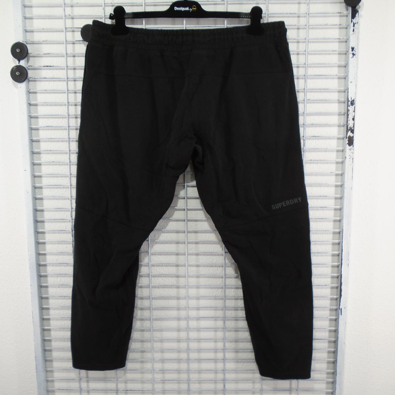 Pantalones de mujer Superdry. Negro. XL. Usado. Bien