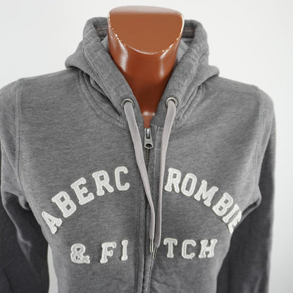 Sudadera con capucha para mujer Abercrombie &amp; Fitch. Gris. Talla L. Usada. En buen estado.