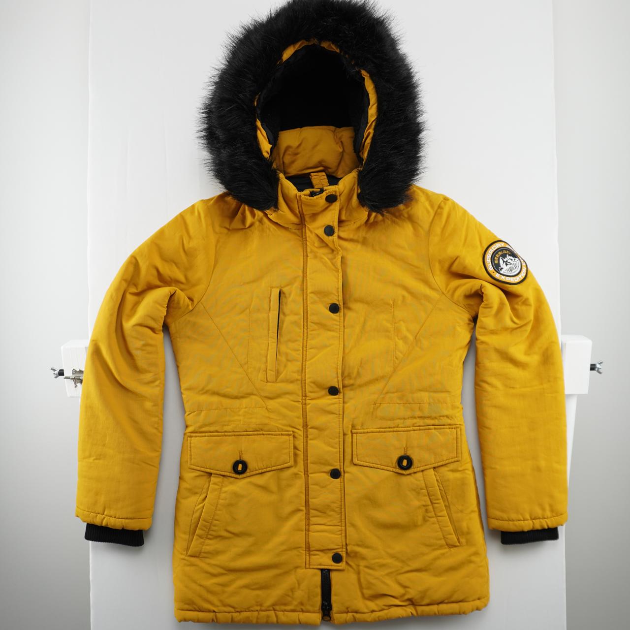 Parka de mujer Superdry. Amarillo. M. Usado. Bien