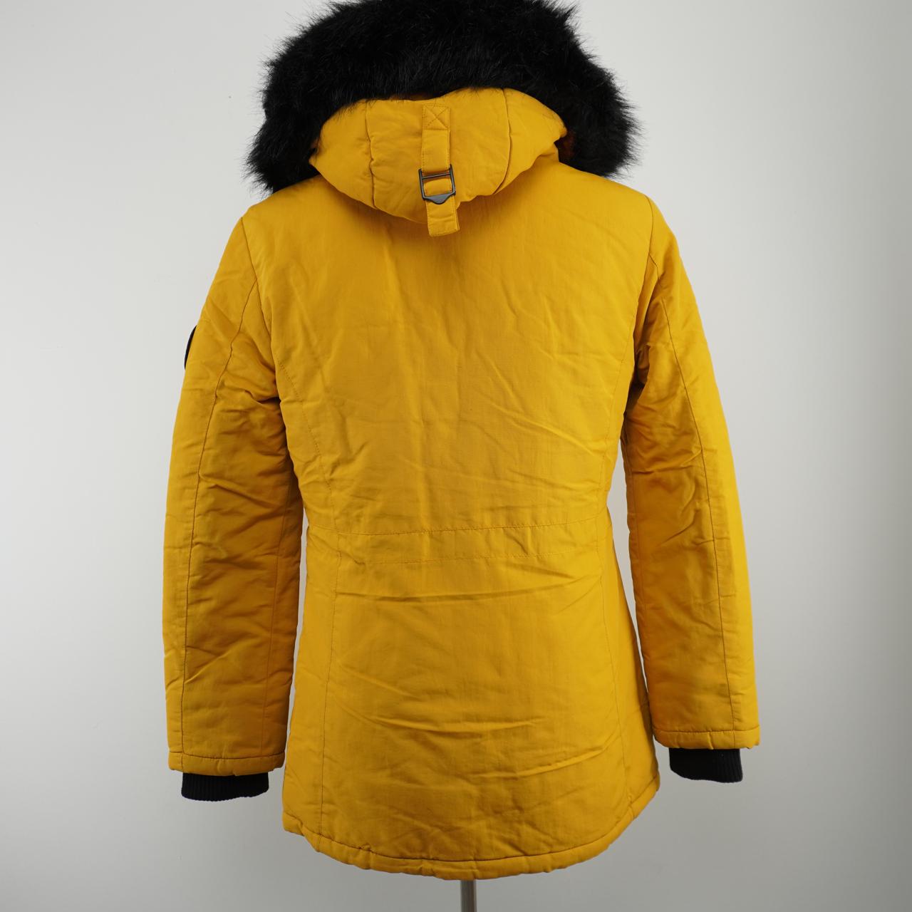 Parka de mujer Superdry. Amarillo. M. Usado. Bien