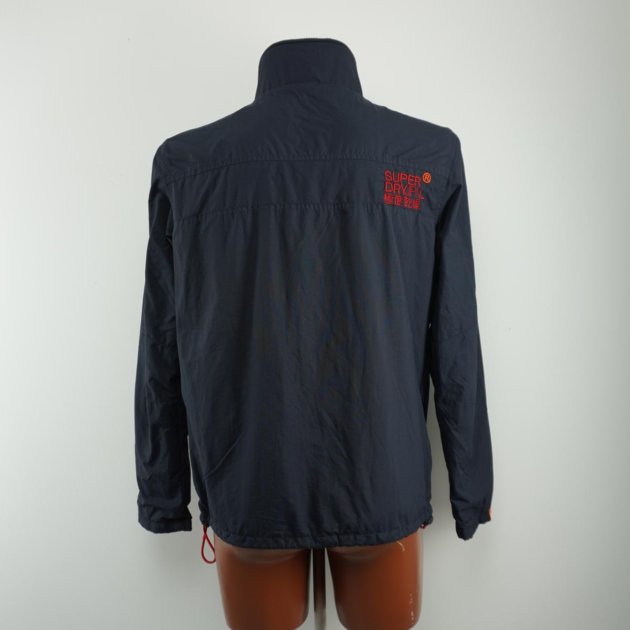 Chaqueta de hombre Superdry. Azul oscuro. M. Usado. Bien