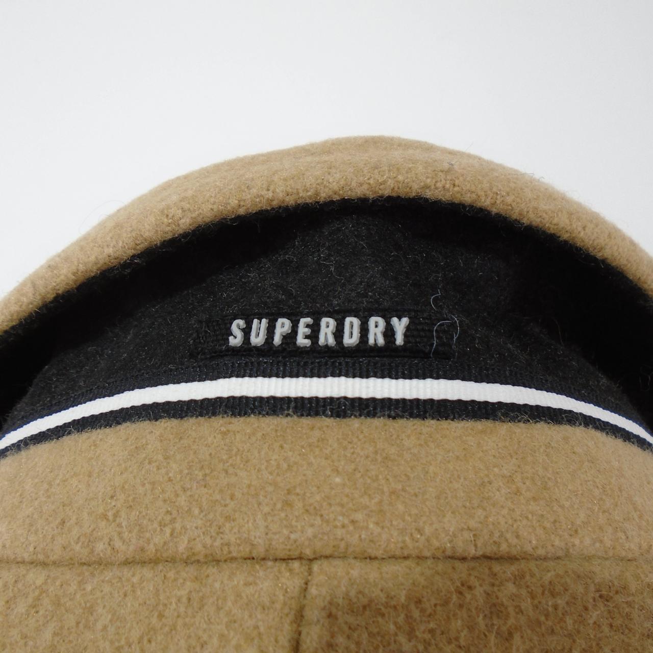 Abrigo de mujer Superdry. Marrón. M. Usado. Bien