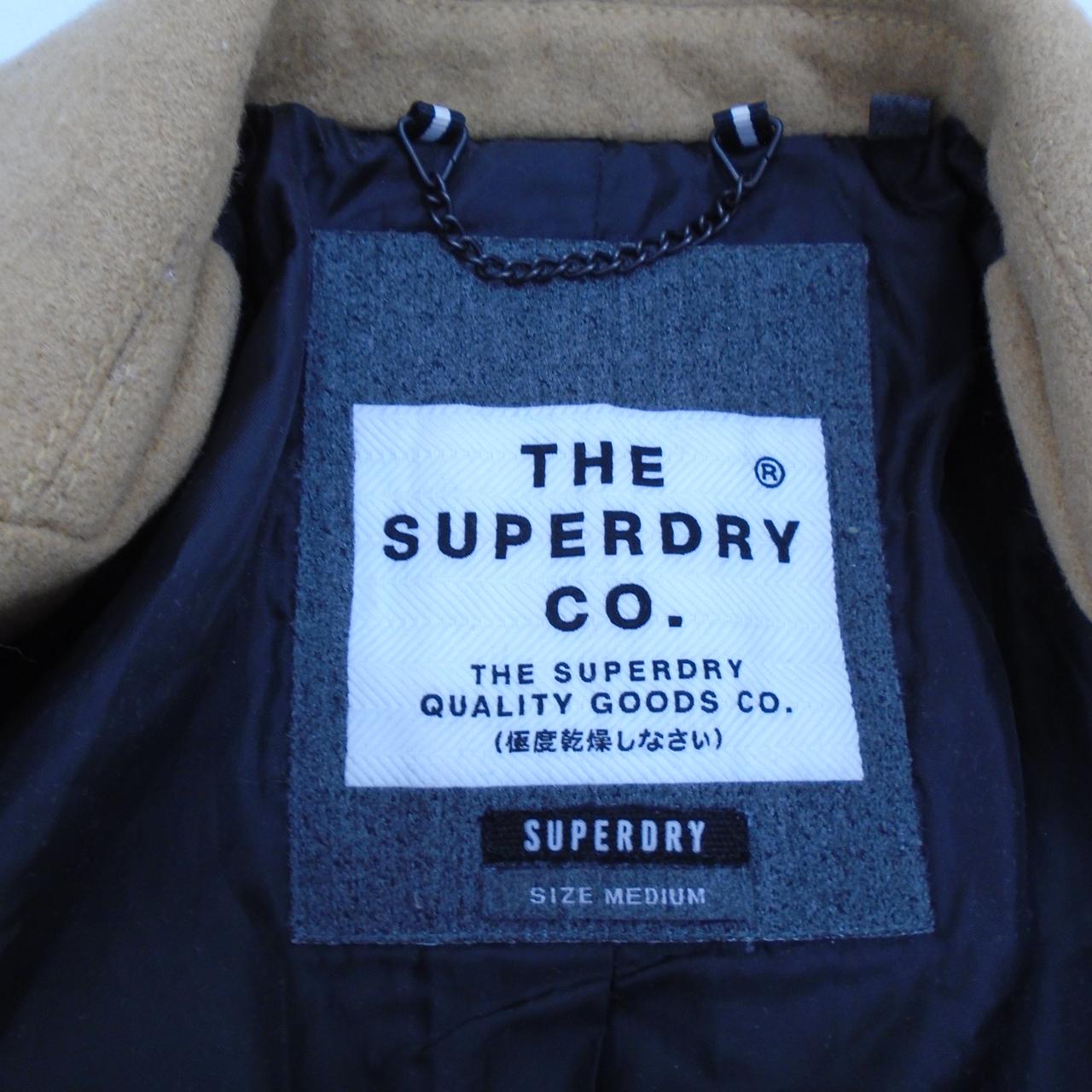 Abrigo de mujer Superdry. Marrón. M. Usado. Bien