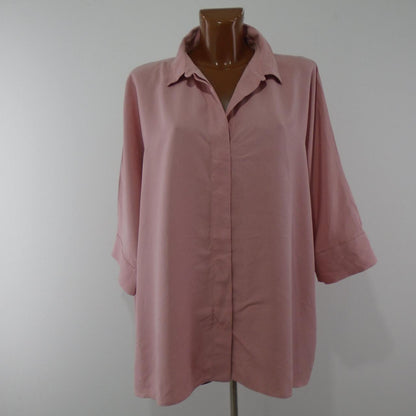 Camisa de mujer Cos. Rosa. M. Usada. Buena