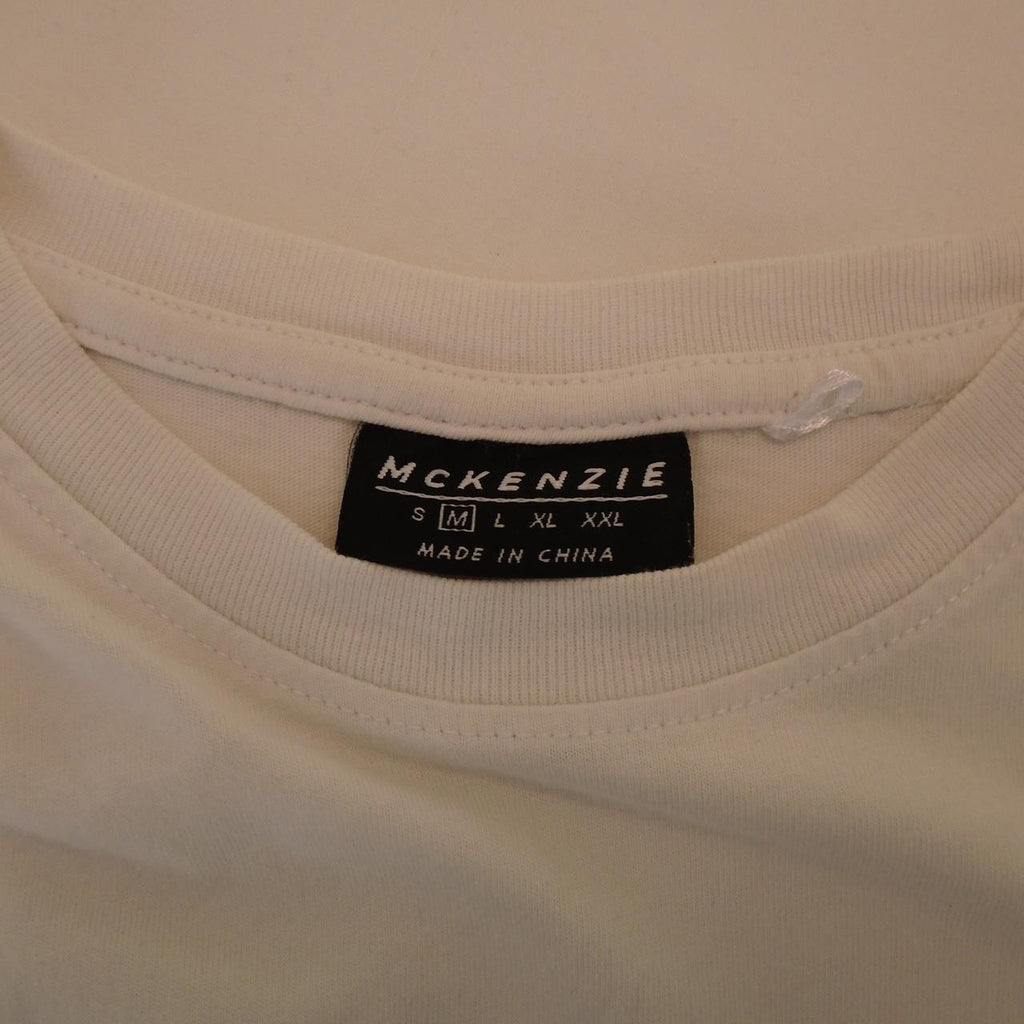 T-shirt homme Mckinze.  Multicolore.  M. Utilisé.  Bien