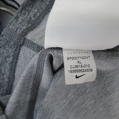 Camiseta Mujer Nike. Gris. SG. Usado. Muy bien