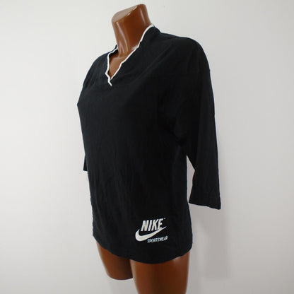 Camiseta Mujer Nike.  Negro.  XS.  Usó.  Muy bien