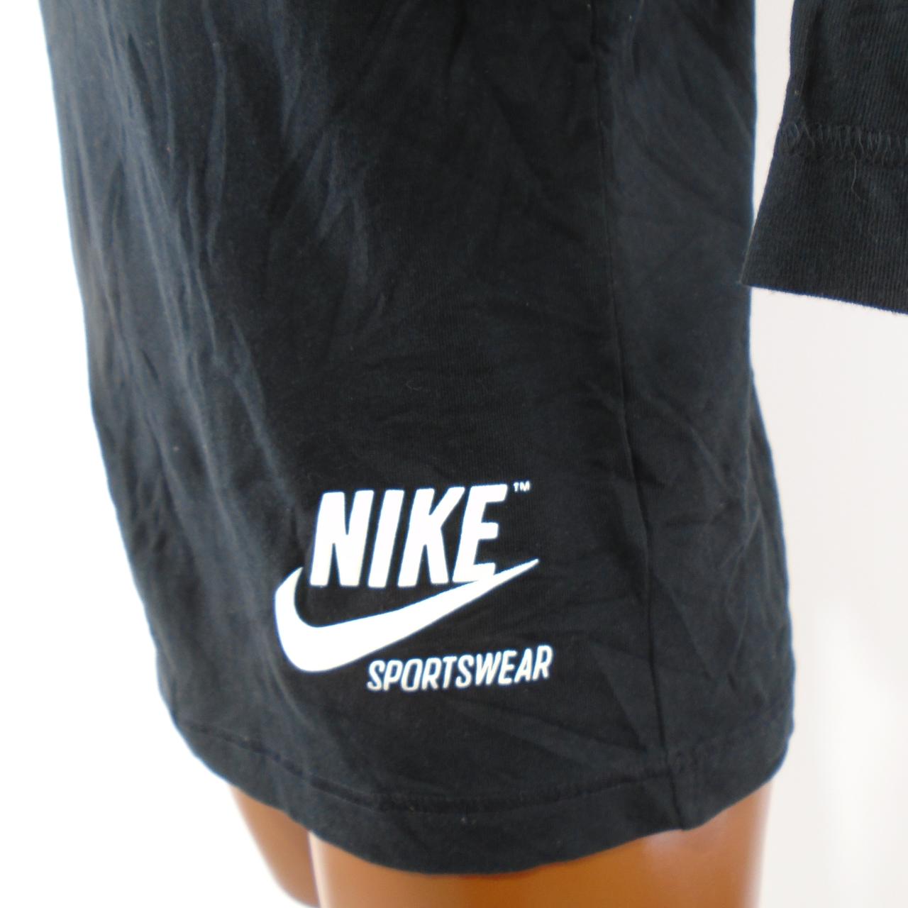 Camiseta Mujer Nike.  Negro.  XS.  Usó.  Muy bien
