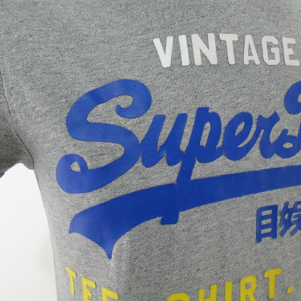 Camiseta Hombre Superdry Vintage. Gris. XS. Usado. Bien
