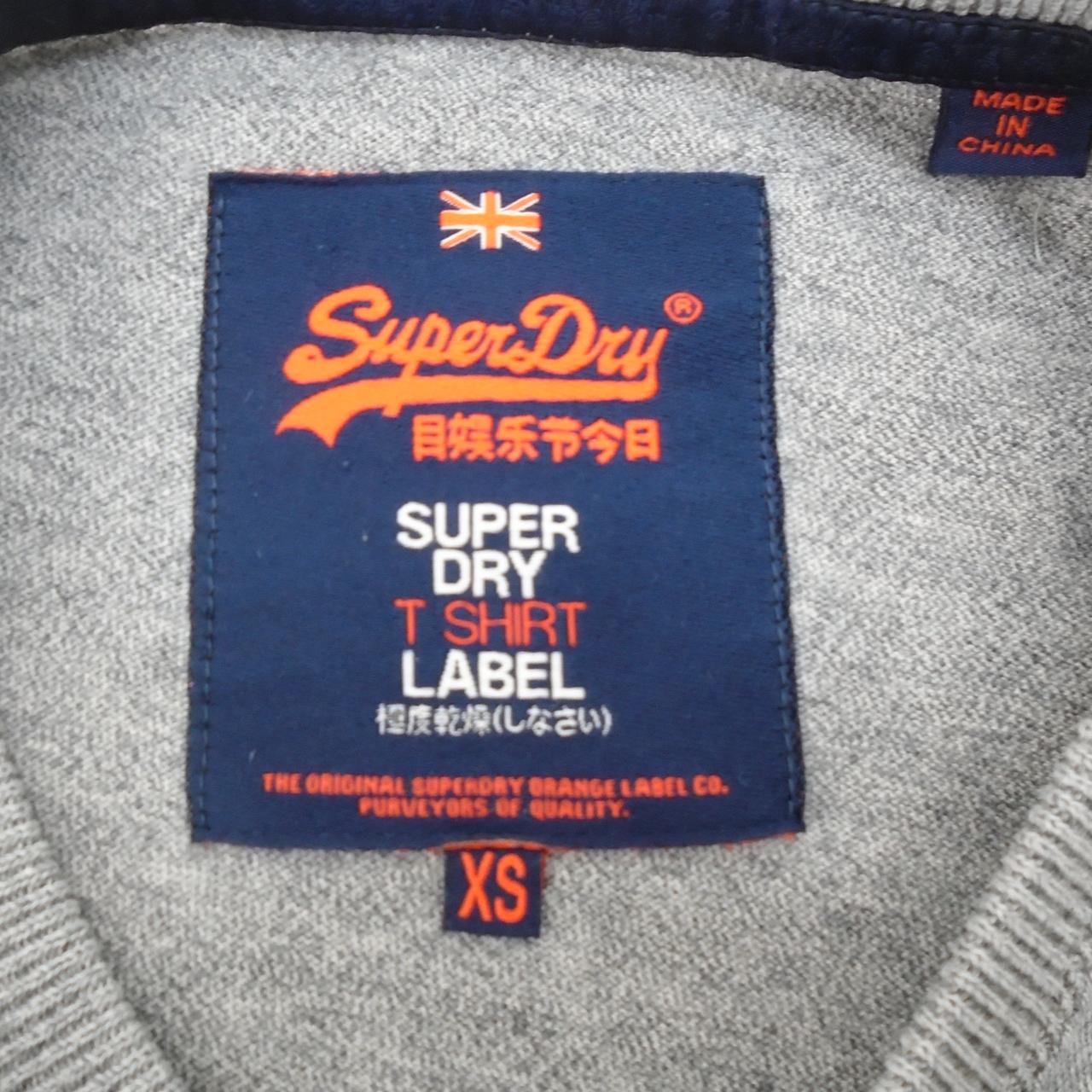 Camiseta Hombre Superdry Vintage. Gris. XS. Usado. Bien