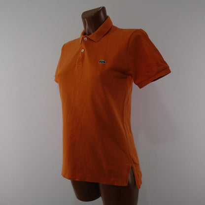 Women's Polo Lacoste. Orange. S. Used. Good