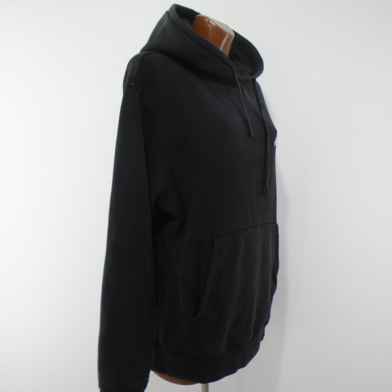 Sudadera con capucha de mujer stussy. Negro. L. Usado. Bien