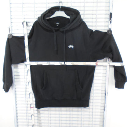 Sudadera con capucha de mujer stussy. Negro. L. Usado. Bien