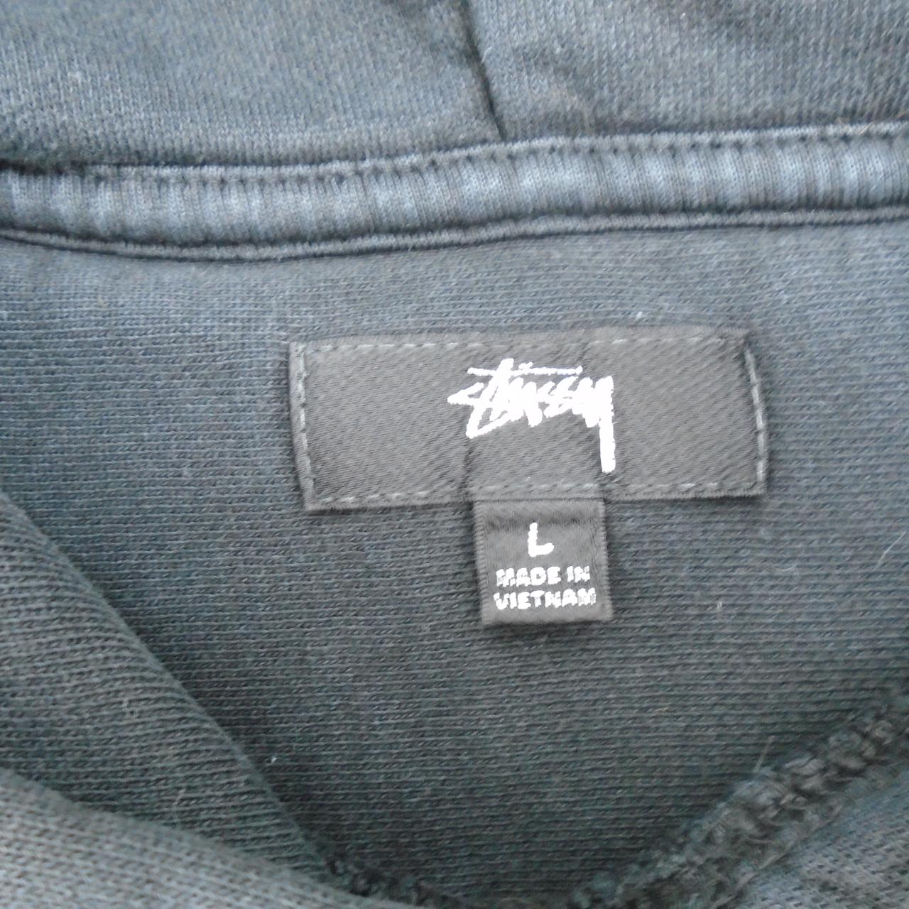 Sudadera con capucha de mujer stussy. Negro. L. Usado. Bien