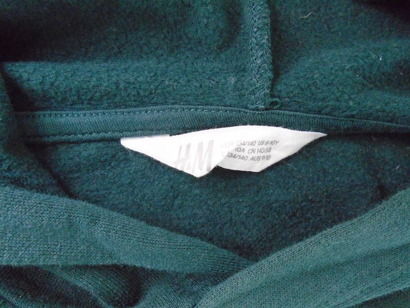 Sweat à capuche femme H&M. La couleur verte. Taille : XS.
