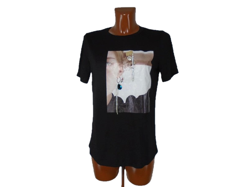 Camiseta Mujer MD. De color negro. Tamaño: S.