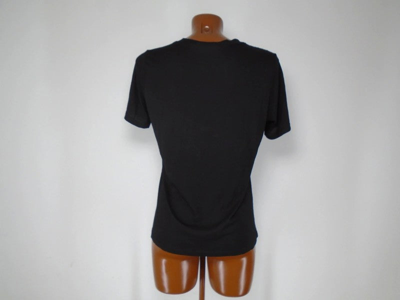 Camiseta Mujer MD. De color negro. Tamaño: S.