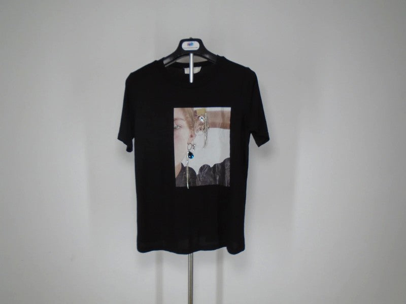 Camiseta Mujer MD. De color negro. Tamaño: S.