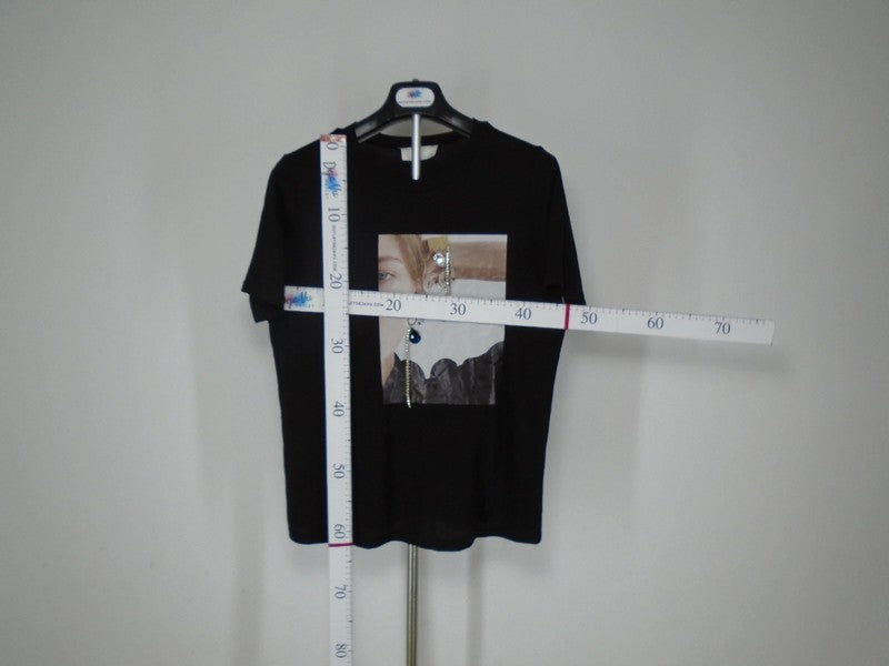 Camiseta Mujer MD. De color negro. Tamaño: S.