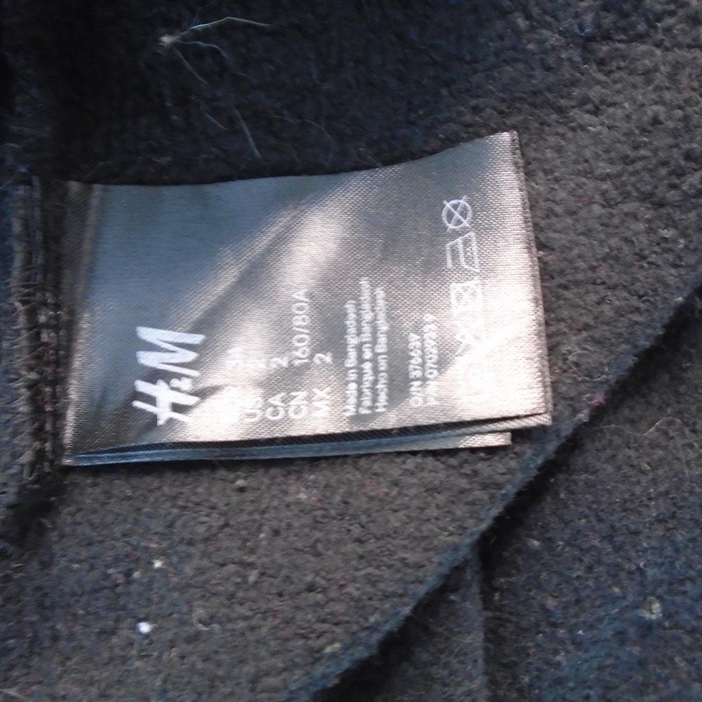 Sweat à capuche femme H&M. Le noir. XS. Utilisé. Bien