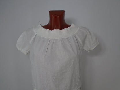 Camiseta de mujer H&M. Blanco. XS. Usó. Muy buena condicion