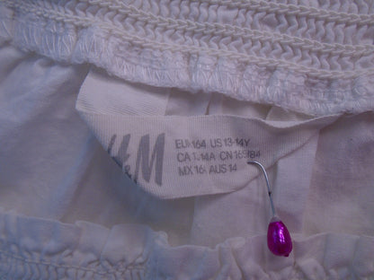 Camiseta de mujer H&M. Blanco. XS. Usó. Muy buena condicion
