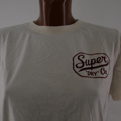 Camiseta de Superdry para mujer. Beige. SG. Usado. Bien