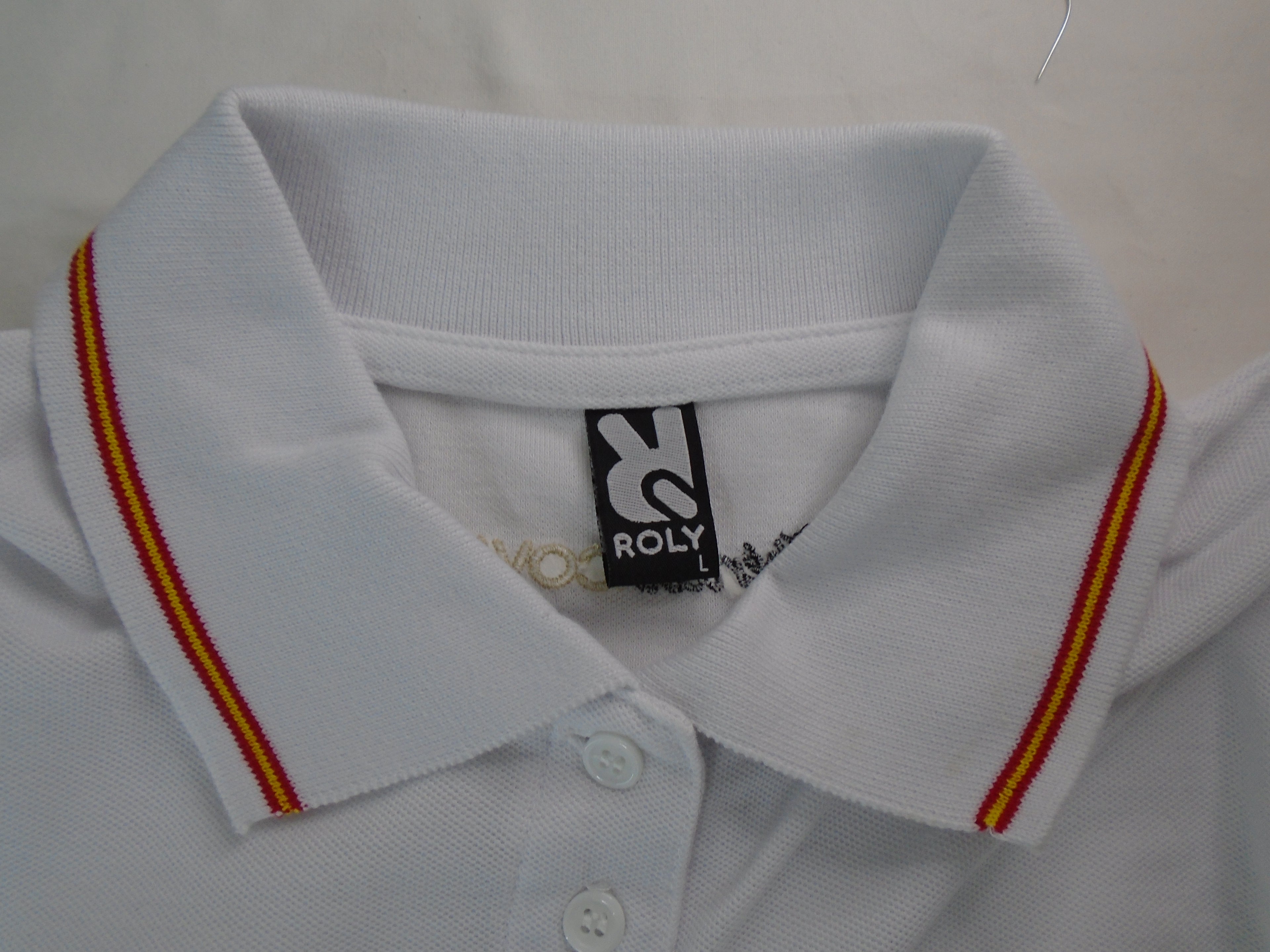 Polo Femme Roly. Blanc. S. Utilisé. Très bonne condition