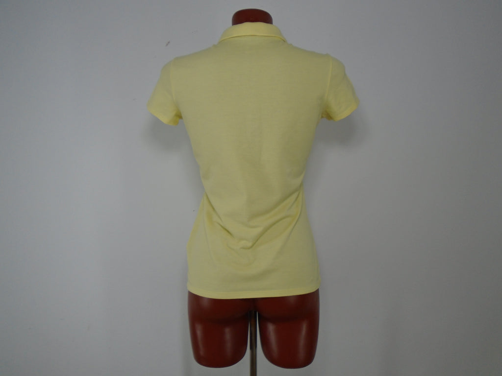 Camiseta Mujer Decathlon. Amarillo. XS. nuevo sin etiquetas