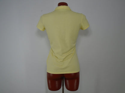 Camiseta Mujer Decathlon. Amarillo. XS. nuevo sin etiquetas