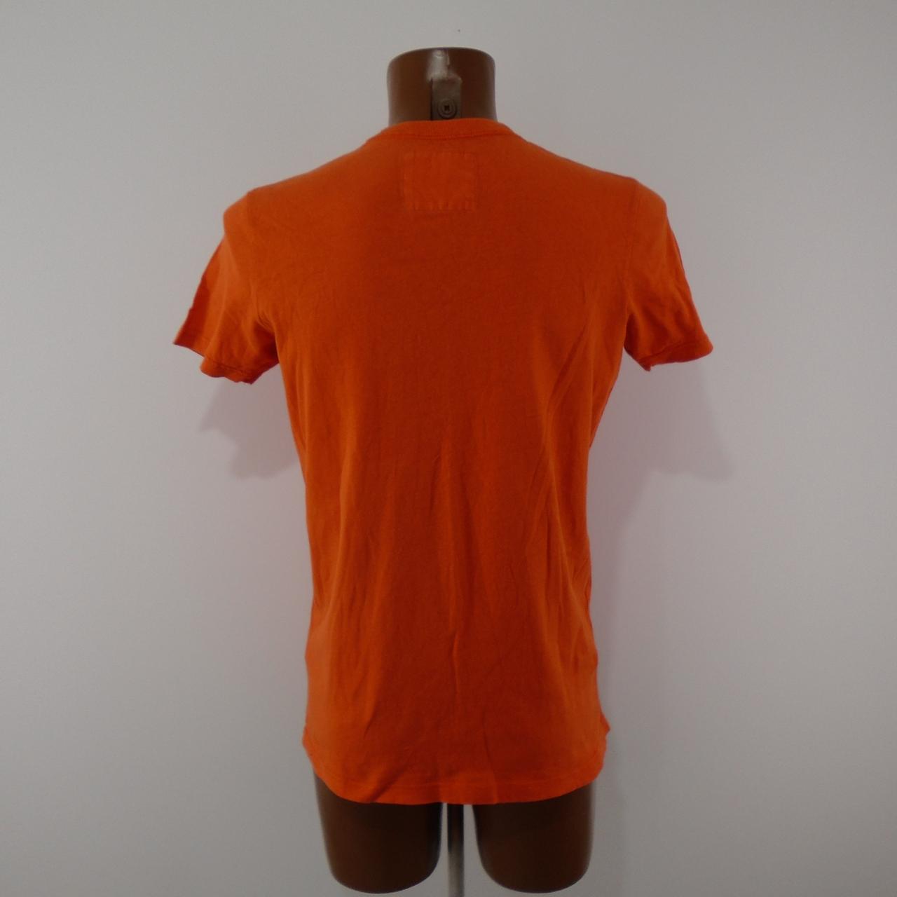 Camiseta de hombre Hollister.  Naranja.  M.Usado.  Bien